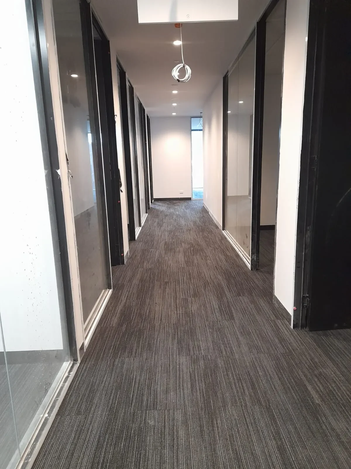 85 Spring Street: Carpet tile, view 7